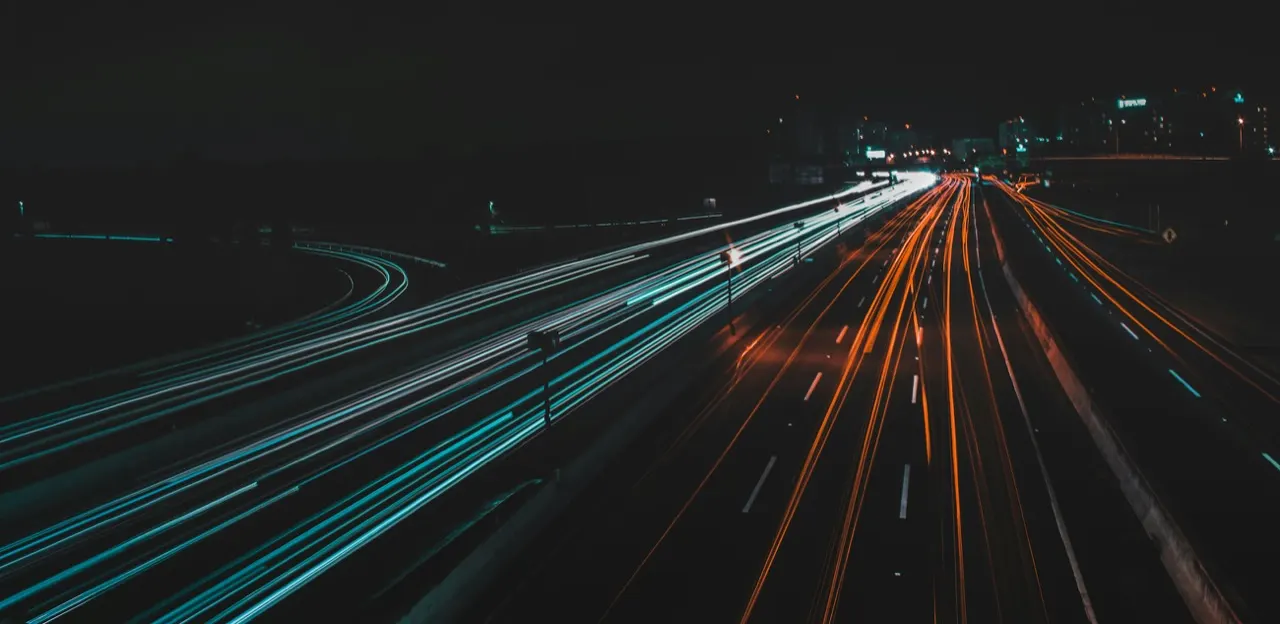 Light trails of traffic on a motorway at night